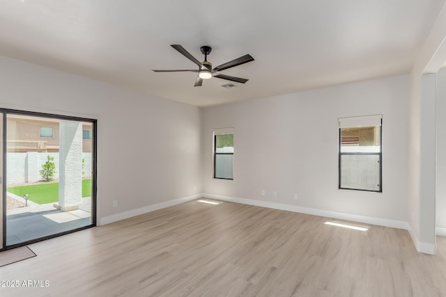 742 W Vineyard Plains Dr, San Tan Valley, AZ 85143 - empty room with light wood-style floors and a ceiling fan