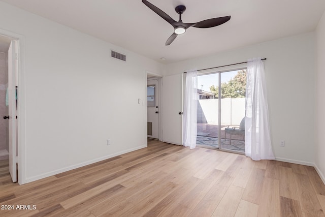 unfurnished room featuring ceiling fan and light hardwood / wood-style floors