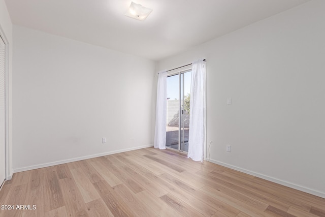 unfurnished room featuring light hardwood / wood-style flooring