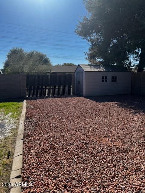 exterior space featuring a storage shed