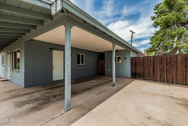 2019 W Stella Ln, Phoenix, AZ 85015 - view of patio with an attached carport and driveway