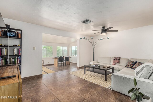 2019 W Stella Ln, Phoenix, AZ 85015 - living room with a ceiling fan and baseboards
