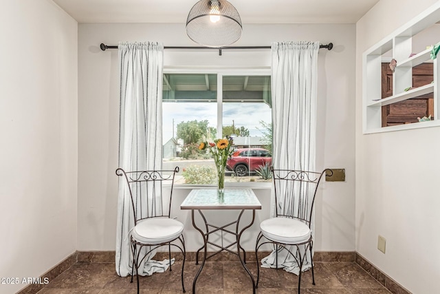 2019 W Stella Ln, Phoenix, AZ 85015 - dining room featuring baseboards