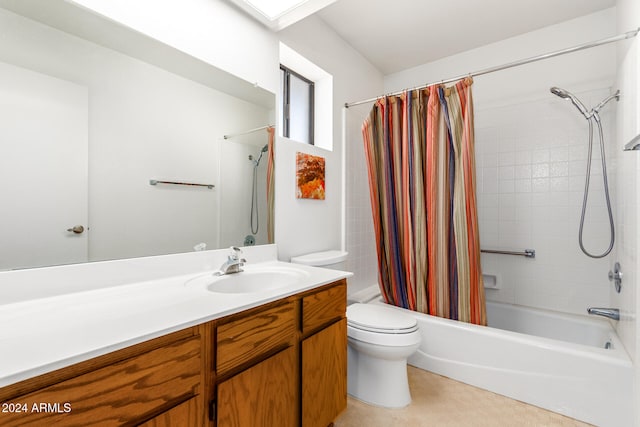 full bathroom with shower / bath combo, vanity, and toilet