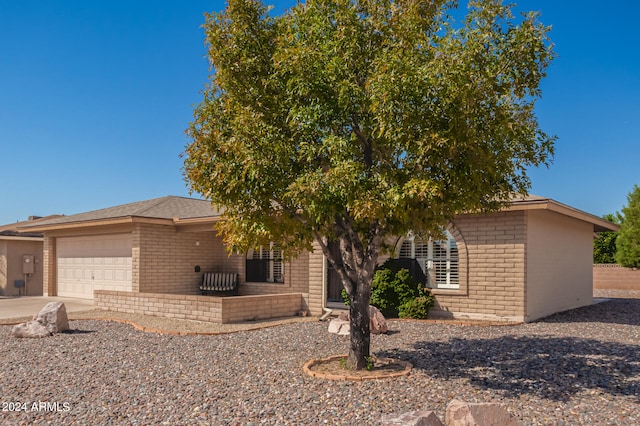 view of front of property with a garage