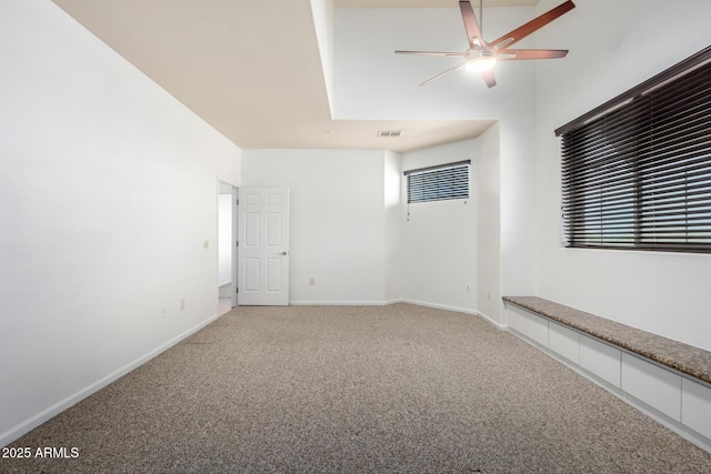 20801 N 90th Pl Unit 210, Scottsdale, AZ 85255 - unfurnished room with visible vents, carpet, ceiling fan, and baseboards