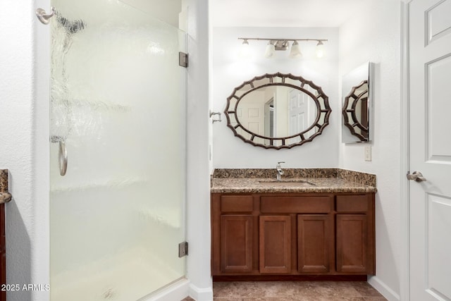 20801 N 90th Pl Unit 210, Scottsdale, AZ 85255 - full bath with vanity, baseboards, and a stall shower