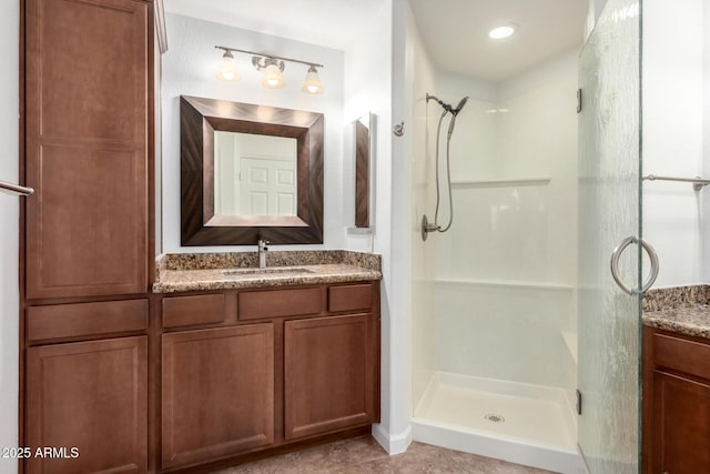 20801 N 90th Pl Unit 210, Scottsdale, AZ 85255 - bathroom featuring vanity, tile patterned flooring, and a stall shower