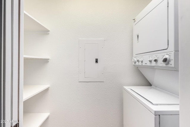 20801 N 90th Pl Unit 210, Scottsdale, AZ 85255 - clothes washing area featuring laundry area, stacked washer and dryer, and electric panel