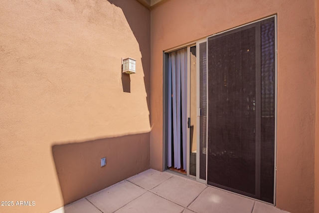 20801 N 90th Pl Unit 210, Scottsdale, AZ 85255 - entrance to property featuring a patio and stucco siding