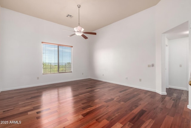 20801 N 90th Pl Unit 210, Scottsdale, AZ 85255 - unfurnished room with baseboards, a ceiling fan, dark wood-style floors, and visible vents
