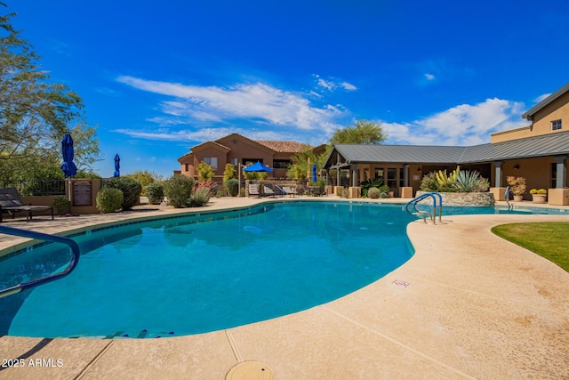 20801 N 90th Pl Unit 210, Scottsdale, AZ 85255 - pool featuring a patio area and fence