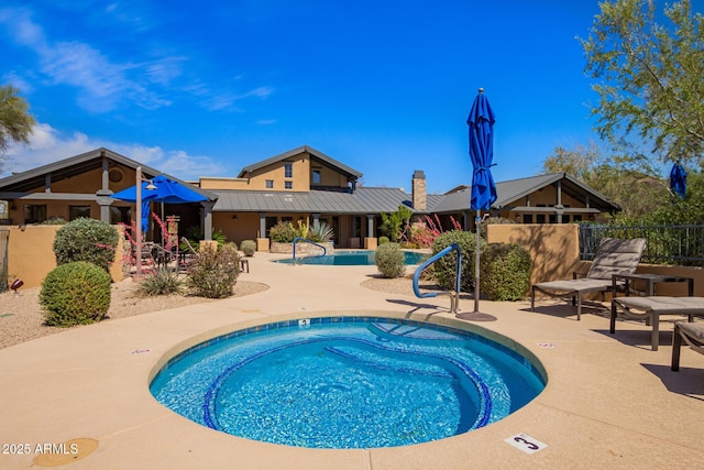 20801 N 90th Pl Unit 210, Scottsdale, AZ 85255 - pool with fence, a patio, and a community hot tub