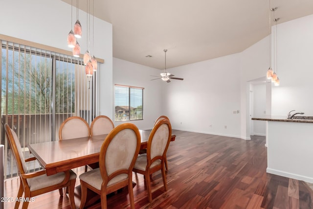 20801 N 90th Pl Unit 210, Scottsdale, AZ 85255 - dining space featuring baseboards, ceiling fan, and dark wood-type flooring