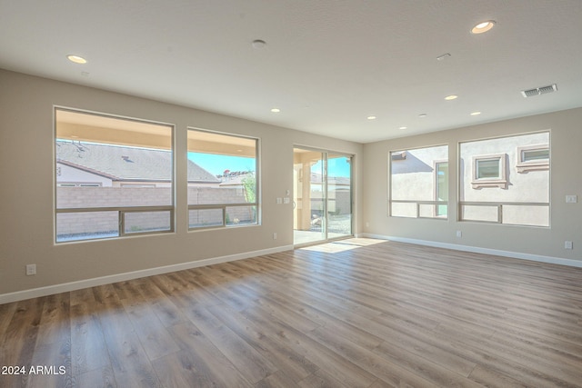 empty room with light wood-type flooring