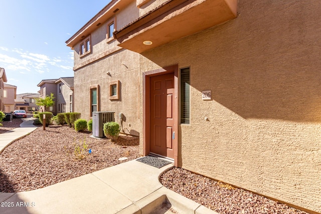 property entrance featuring central AC