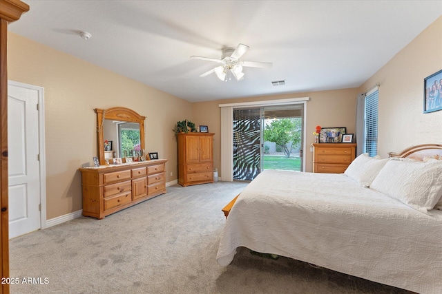 bedroom with baseboards, visible vents, ceiling fan, light carpet, and access to outside