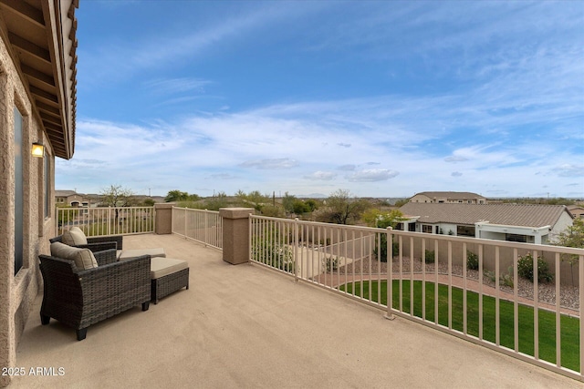 view of patio / terrace with a balcony