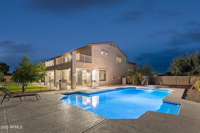 view of swimming pool with a patio, a fenced backyard, and a fenced in pool