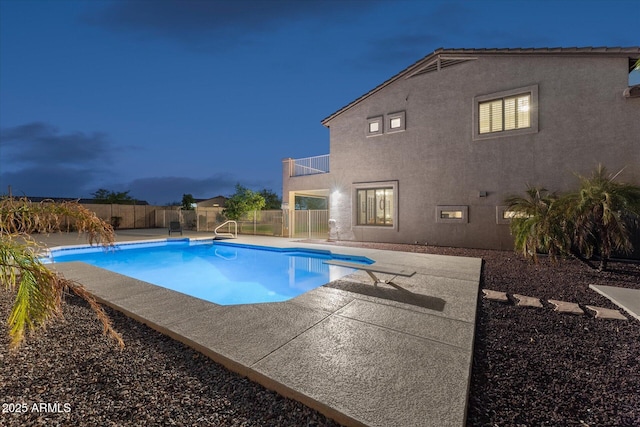 view of swimming pool with a patio area, a fenced backyard, and a fenced in pool