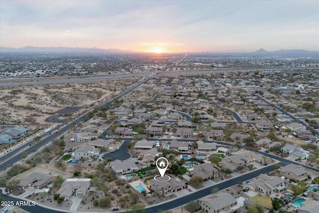 bird's eye view with a residential view and a mountain view