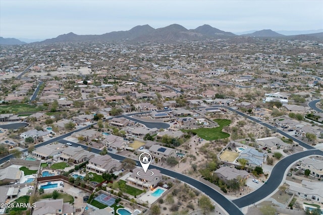 bird's eye view with a residential view and a mountain view