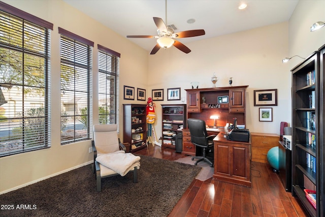 office featuring dark hardwood / wood-style floors and ceiling fan