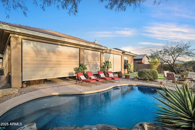 view of pool featuring a patio area