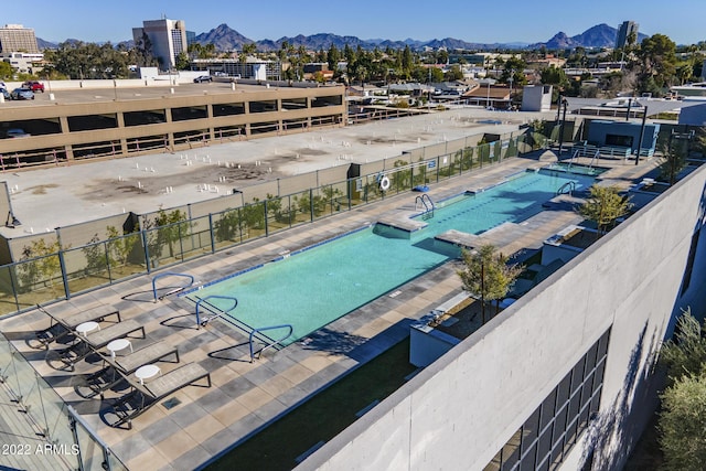 3131 N Central Ave Unit 6017, Phoenix, AZ 85012 - community pool with a mountain view, a community hot tub, and a patio