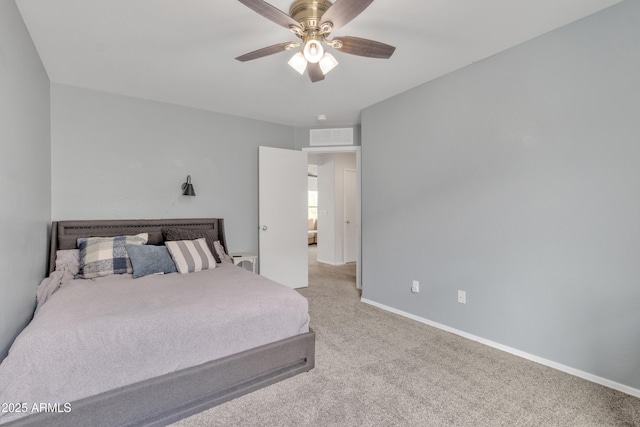 bedroom featuring a ceiling fan, carpet, visible vents, and baseboards