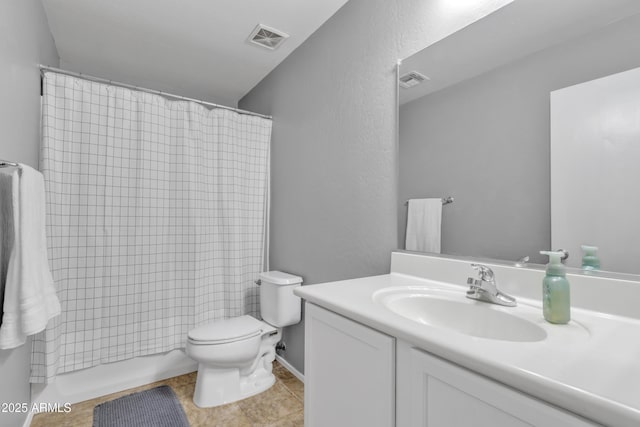 full bath featuring toilet, a textured wall, visible vents, and vanity