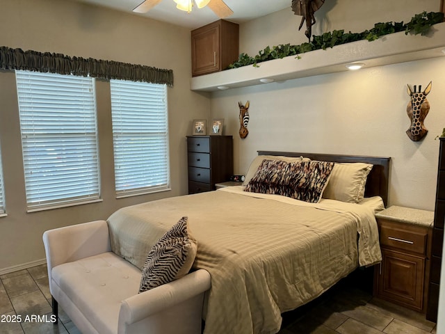 bedroom featuring ceiling fan