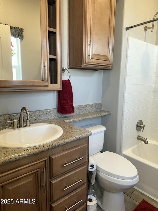 full bathroom featuring vanity, toilet, and shower / bathtub combination