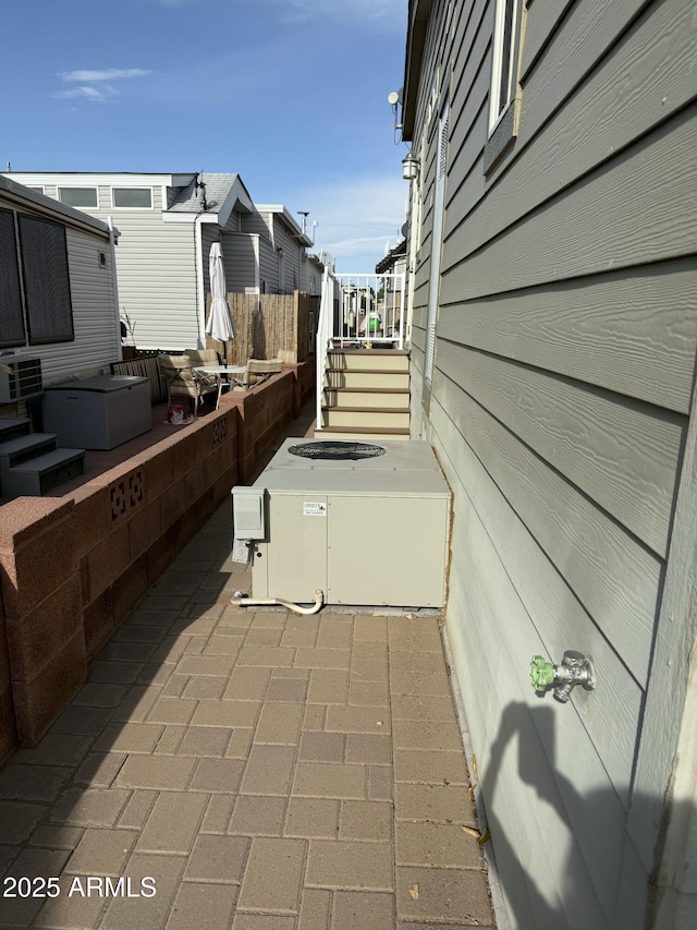 view of patio with central air condition unit