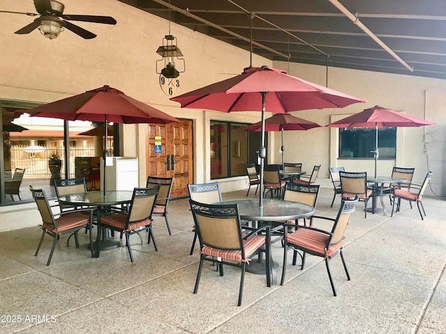 view of patio featuring ceiling fan