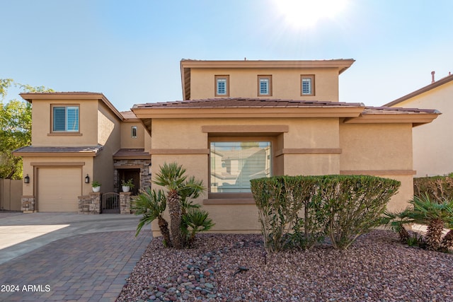 view of front of property with a garage