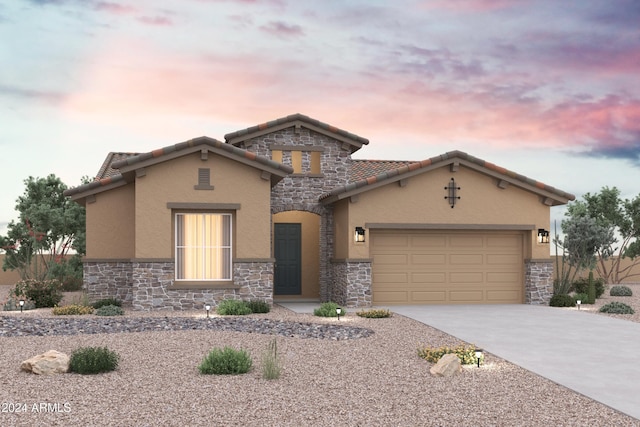 view of front of home with a garage