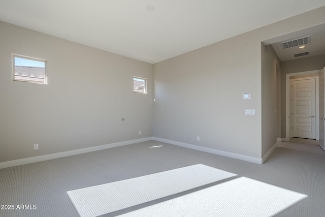 unfurnished room featuring carpet flooring