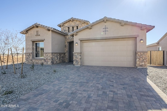 mediterranean / spanish-style house featuring a garage