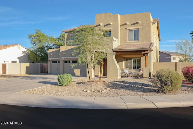 southwest-style home featuring a porch