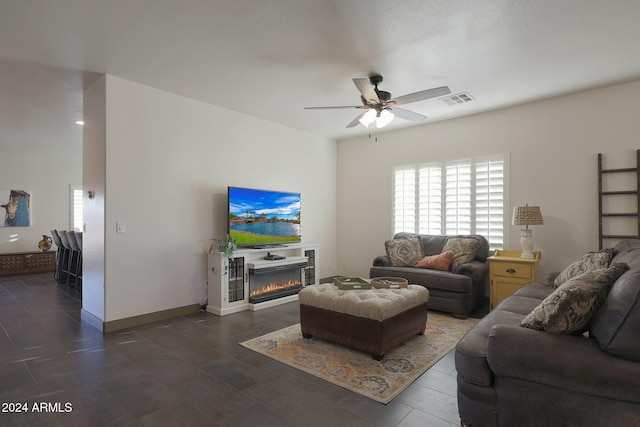 living room featuring ceiling fan