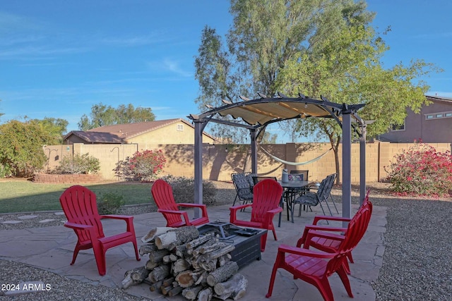 view of patio with a fire pit and a pergola