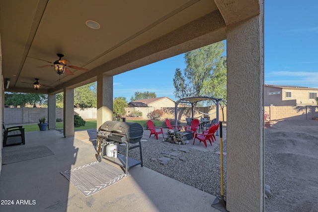 view of patio / terrace featuring ceiling fan and grilling area