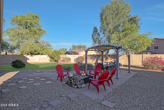 view of patio / terrace with an outdoor fire pit