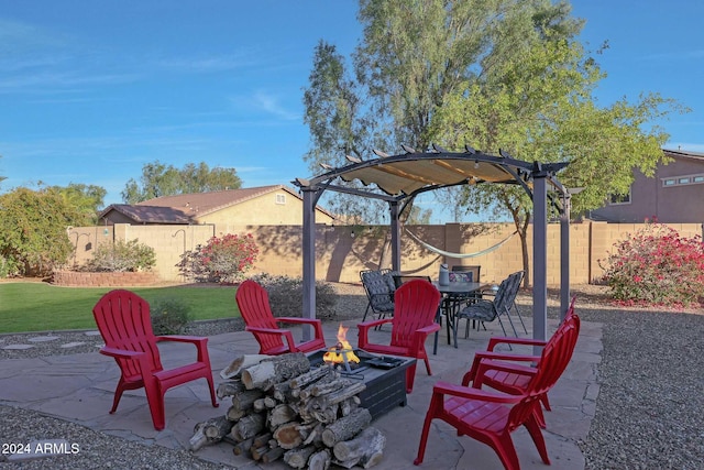 view of patio featuring a pergola and an outdoor fire pit