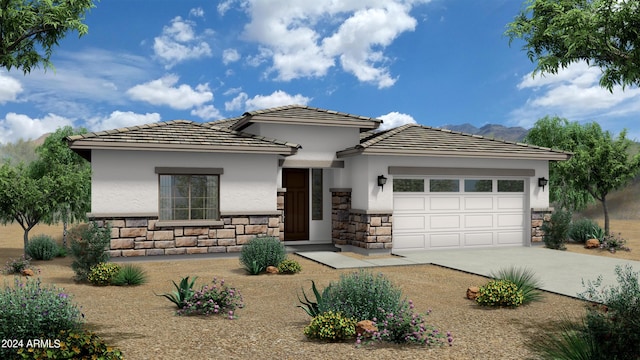 prairie-style home with a garage