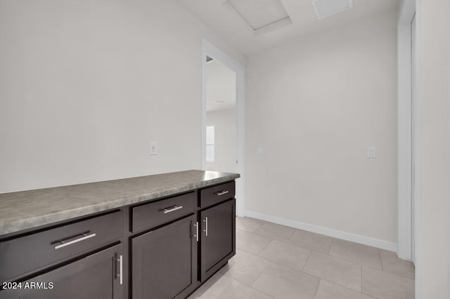 kitchen with light tile patterned floors