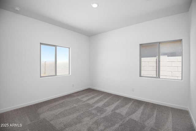 24593 W St Catherine Ave, Buckeye, AZ 85326 - spare room with carpet floors and baseboards