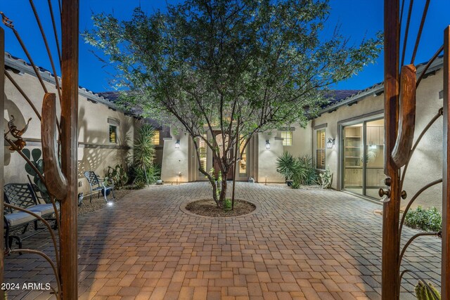 mediterranean / spanish home featuring a garage