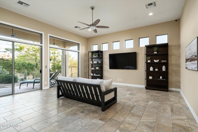 living room with ceiling fan